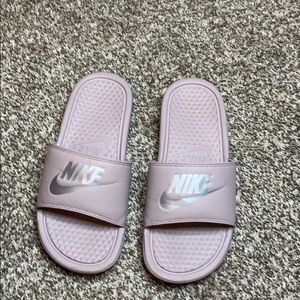 Woman’s Nike slides